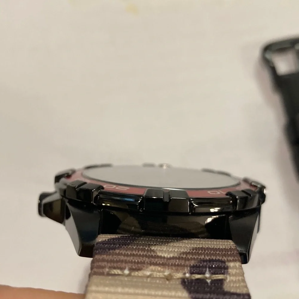 Casio MTD1069 watch, red and black with camo strap & rubber strap, working batty